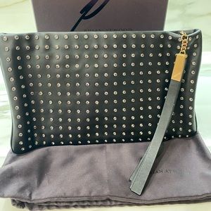 Brian Atwood black studded leather clutch w. Tassel